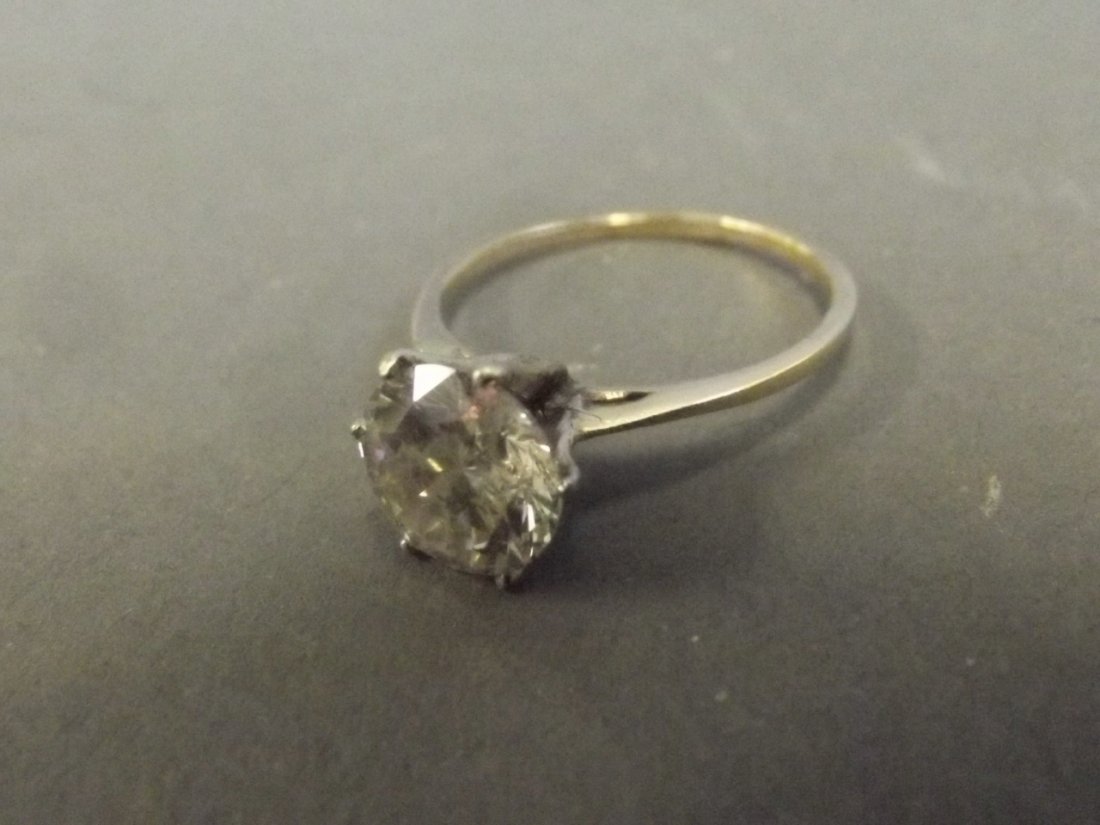 A 14ct gold single stone diamond ring, approximately: A 14ct gold single stone diamond ring, approximately 2.1 carats, size P