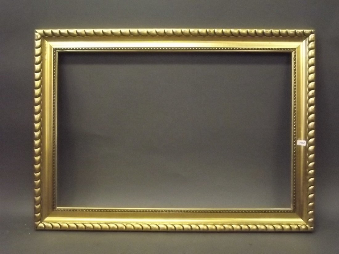 A C19th Continental giltwood and composition frame with: A C19th Continental giltwood and composition frame with rope border, rebate 39'' x 26''