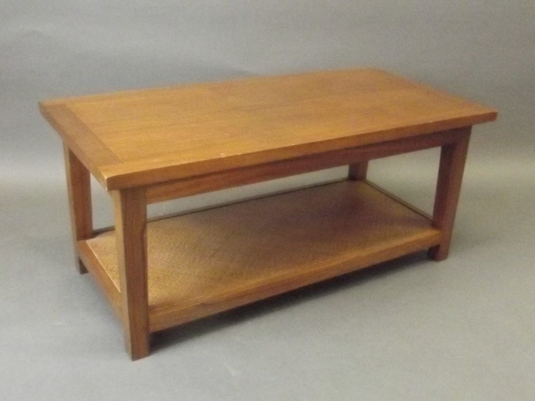 A teak two tier coffee table, 40'' x 20'', 17¾'' high,: A teak two tier coffee table, 40'' x 20'', 17¾'' high, Best Bid