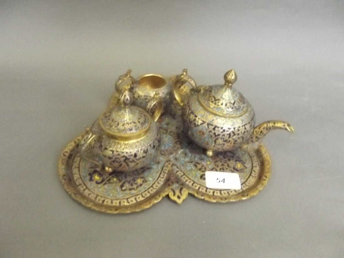 A C19th Kashmiri ornate gilt brass and enamelled three: A C19th Kashmiri ornate gilt brass and enamelled three piece tea service on tray, 4'' high