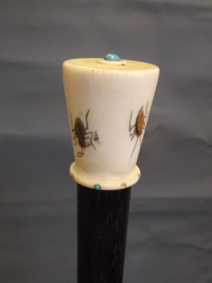 A walking cane with a shibiyama insect inlaid handle,: A walking cane with a shibiyama insect inlaid handle, 34½'' long