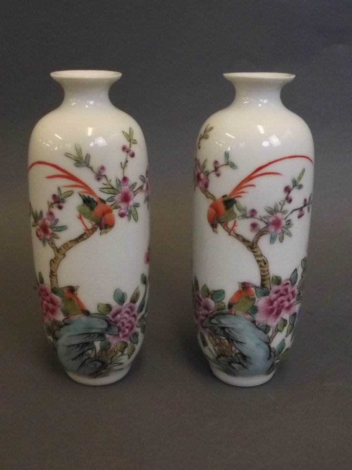 A pair of Chinese porcelain spill vases with painted: A pair of Chinese porcelain spill vases with painted enamel decoration of birds amongst flowers, marked, 5½'' long