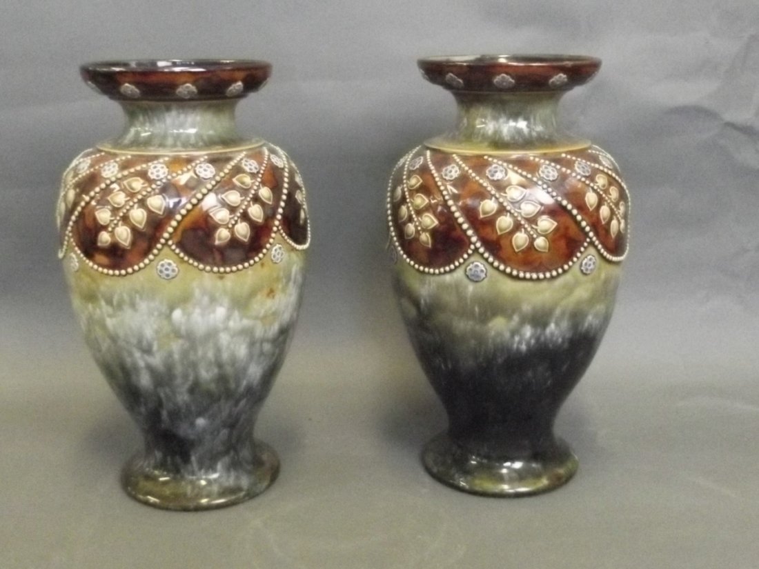 A large pair of Royal Doulton vases with raised flower: A large pair of Royal Doulton vases with raised flower decoration, signed, 11'' high