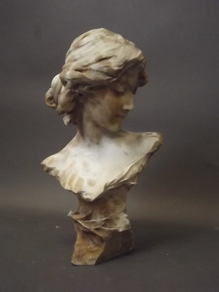 A large alabaster bust of a maiden, 22'' high: A large alabaster bust of a maiden, 22'' high