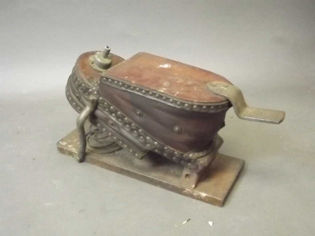 A set of C20th oak and leather foot bellows, 17½'' long: A set of C20th oak and leather foot bellows, 17½'' long