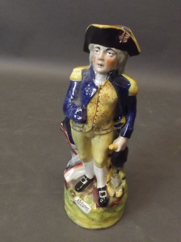 A C19th Staffordshire Toby jug in the form of Lord: A C19th Staffordshire Toby jug in the form of Lord Nelson, 11½'' high