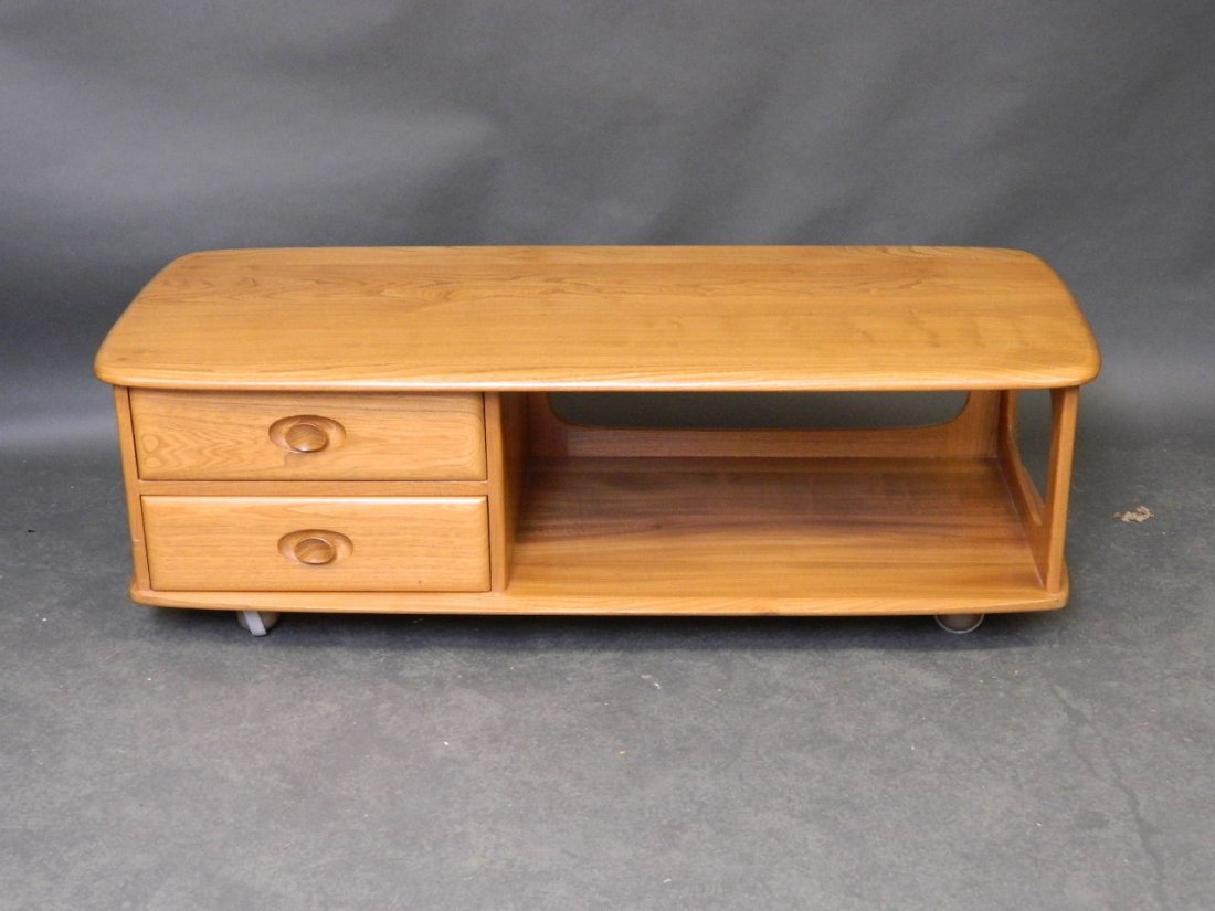 An Ercol oak coffee table with two drawers, 48'' x: An Ercol oak coffee table with two drawers, 48'' x 18½'', 15½'' high