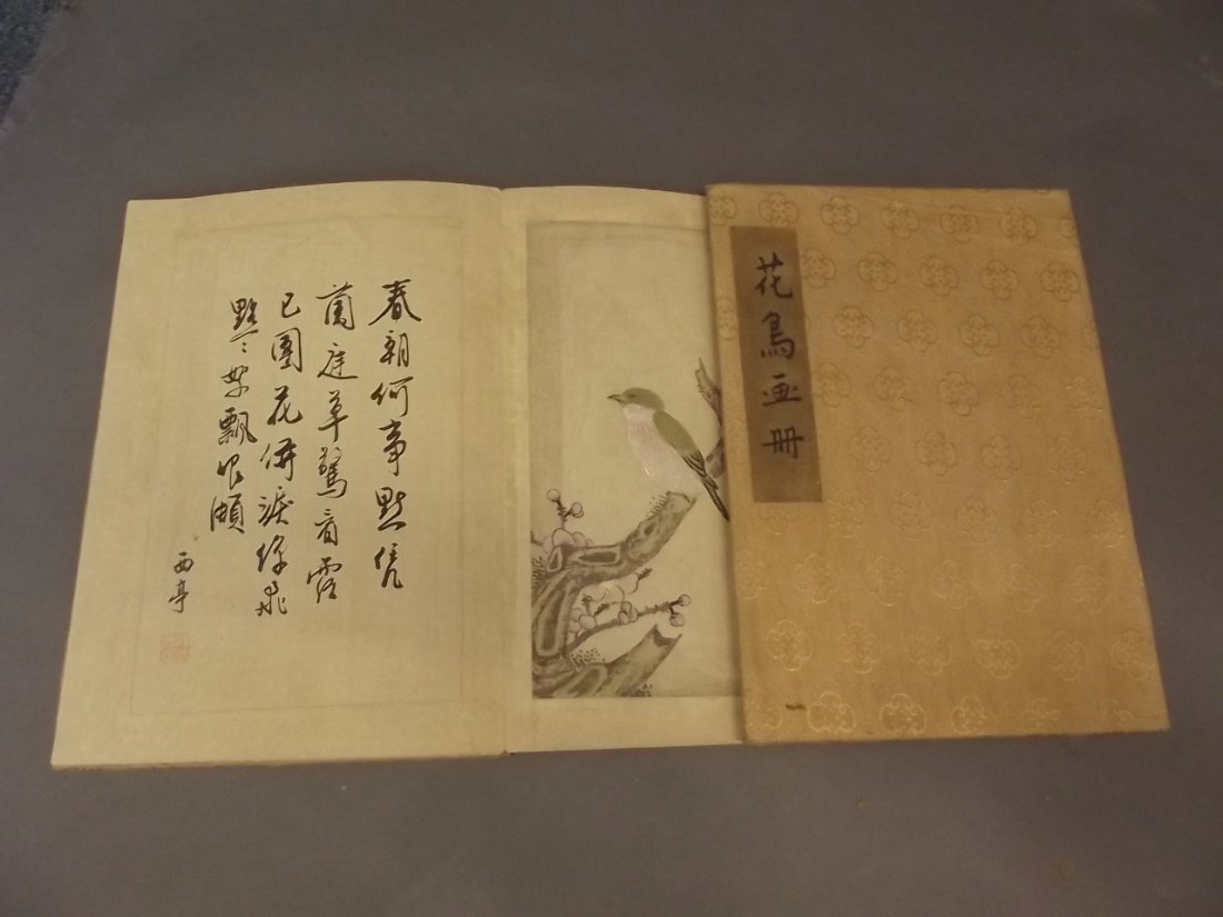 A Chinese concertina book containing watercolours of: A Chinese concertina book containing watercolours of finches and poems, 13'' x 9''