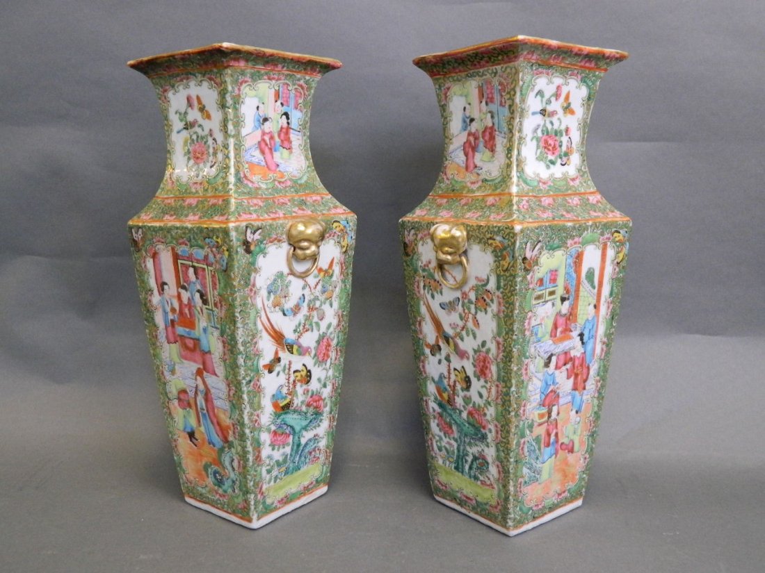 A large pair of Canton enamelled vases, the panels: A large pair of Canton enamelled vases, the panels decorated with butterflies, birds and figures, 12¼'' high