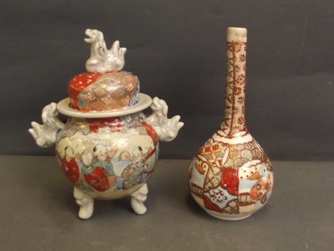 A Satsuma koro decorated with figures with temple lion: A Satsuma koro decorated with figures with temple lion handles, on tripod supports, and a similar long necked vase, 6'' high