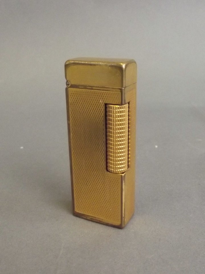 A Dunhill Rollagas gold plated lighter, 2½'' x 1'': A Dunhill Rollagas gold plated lighter, 2½'' x 1'' (AF), Best Bid