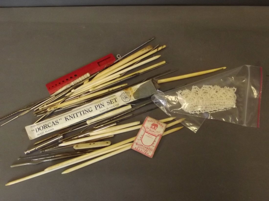A large quantity of bone crochet hooks, metal needle: A large quantity of bone crochet hooks, metal needle cases etc, 8½'' long