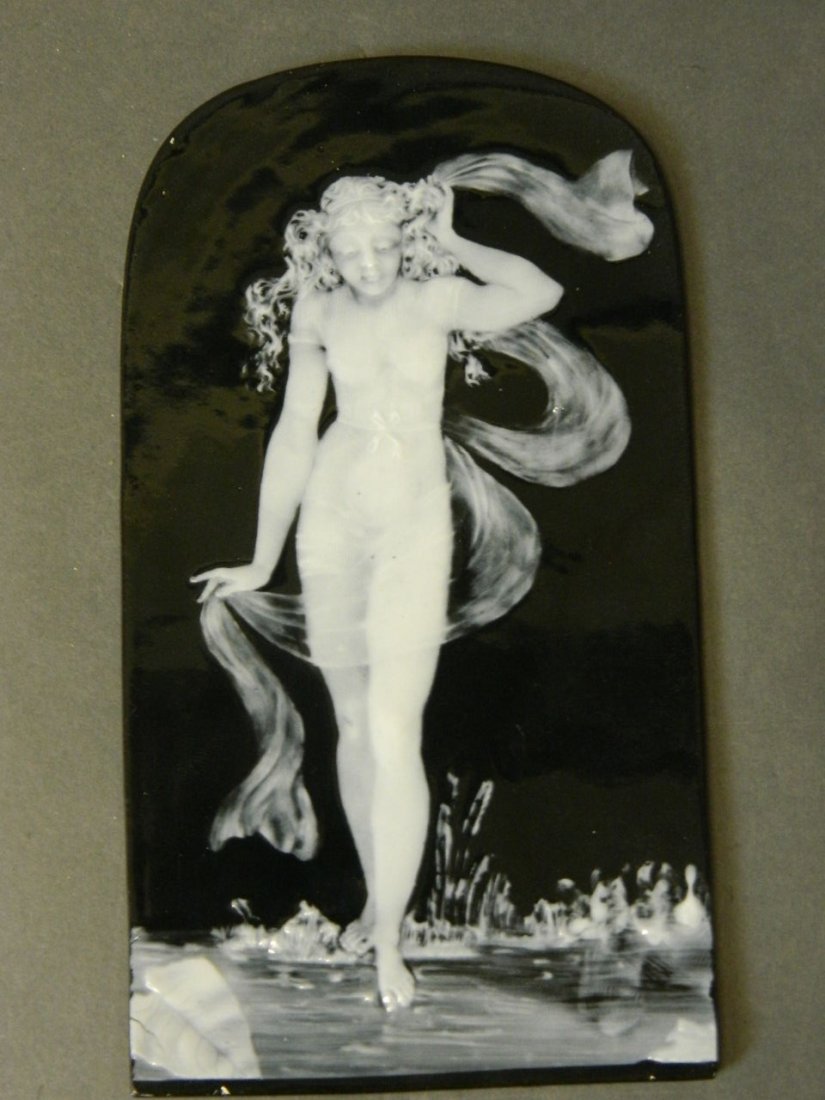 A George Jones pâte-sur-pâte ceramic panel with: A George Jones pâte-sur-pâte ceramic panel with decoration depicting a young woman in diaphanous clothing, impressed G.J. & Sons verso, 7½'' x 4''
