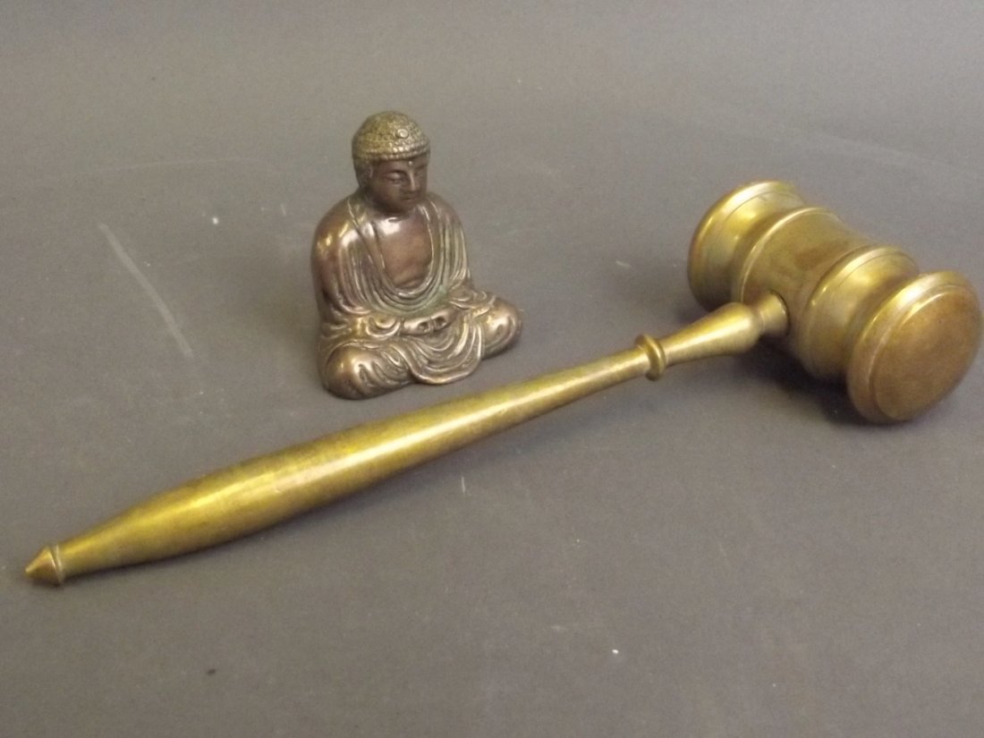A small Chinese bronze figure of Buddha, 4 character: A small Chinese bronze figure of Buddha, 4 character mark, and a brass gavel, gavel 7¾'' long