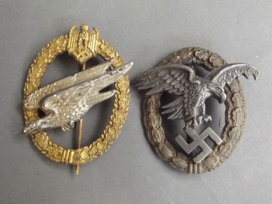 A metal WWII German military 'Luftwaffe Observer': A metal WWII German military 'Luftwaffe Observer' badge, and a gilt and silver WWII German military parachutist badge, 1¾'' x 2''