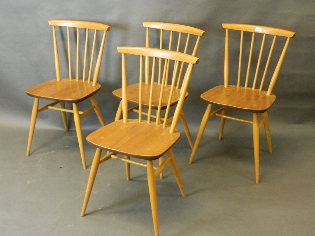 A set of four Ercol stickback dining chairs: A set of four Ercol stickback dining chairs