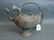 An Islamic bronze pourer in the form of a cockerel with
