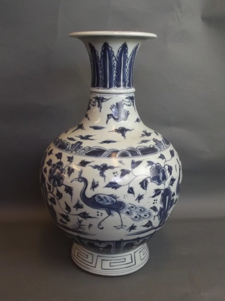 A Chinese blue and white porcelain vase with painted: A Chinese blue and white porcelain vase with painted decoration of phoenix amongst lotus flowers, 6 character mark, 15'' high