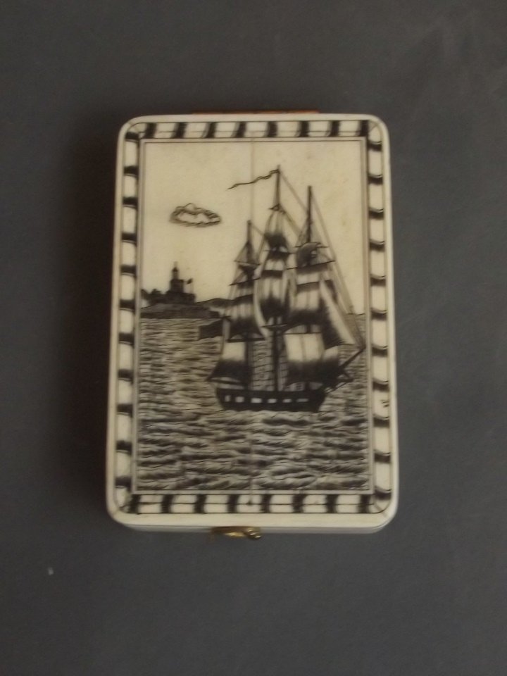 A bone cased compass with Scrimshaw style decoration,: A bone cased compass with Scrimshaw style decoration, 3¾'' long