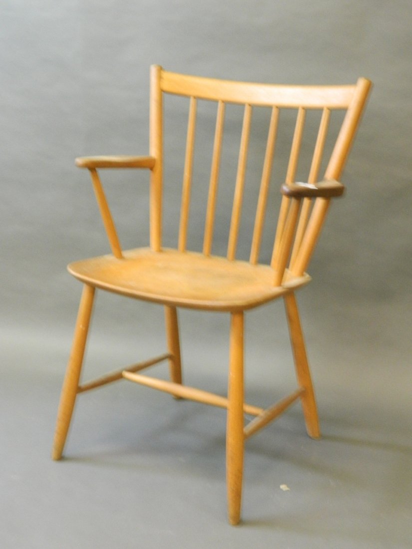 An Ercol style beechwood elbow chair: An Ercol style beechwood elbow chair