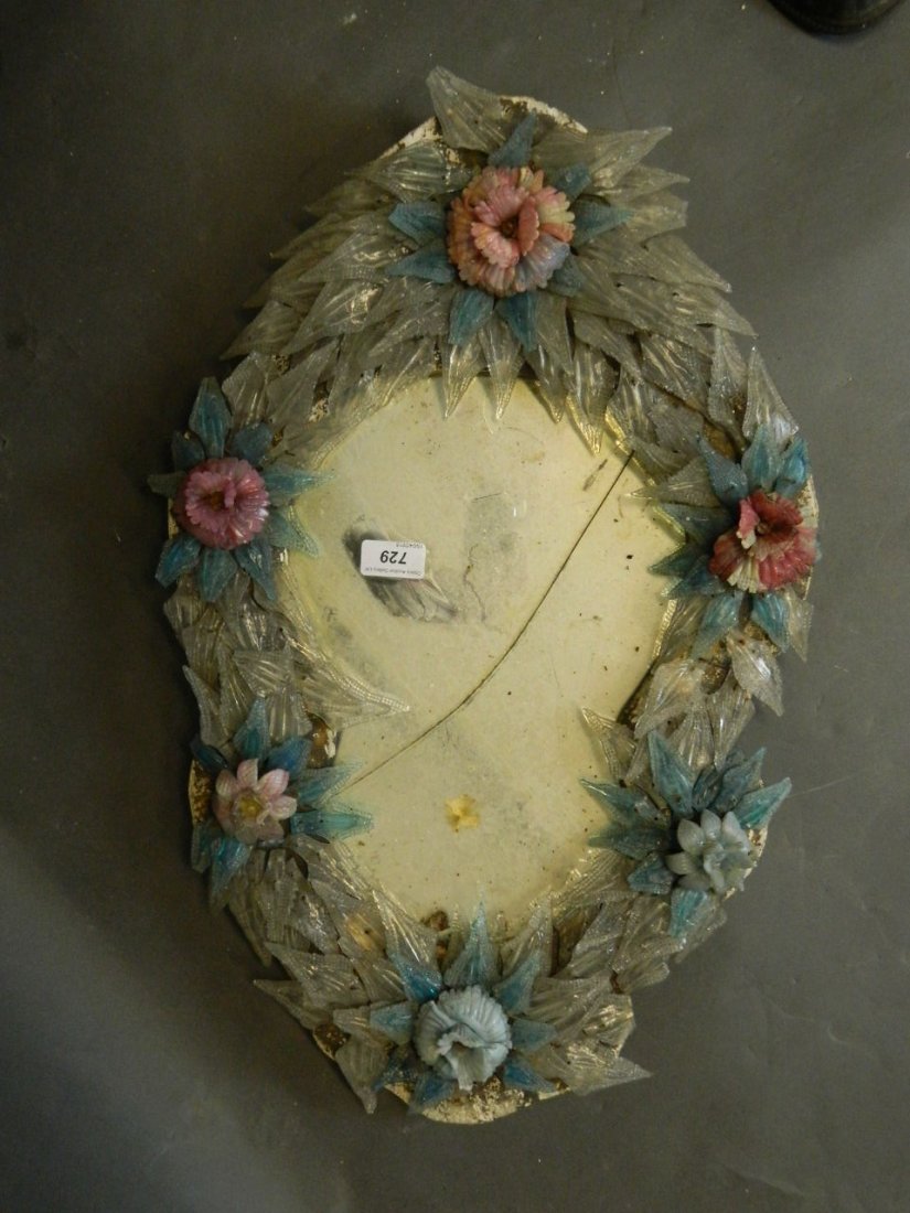 A late C19th Murano pier glass mirror with moulded: A late C19th Murano pier glass mirror with moulded flower and leaf border, 24'' x 16'' (AF), Best Bid