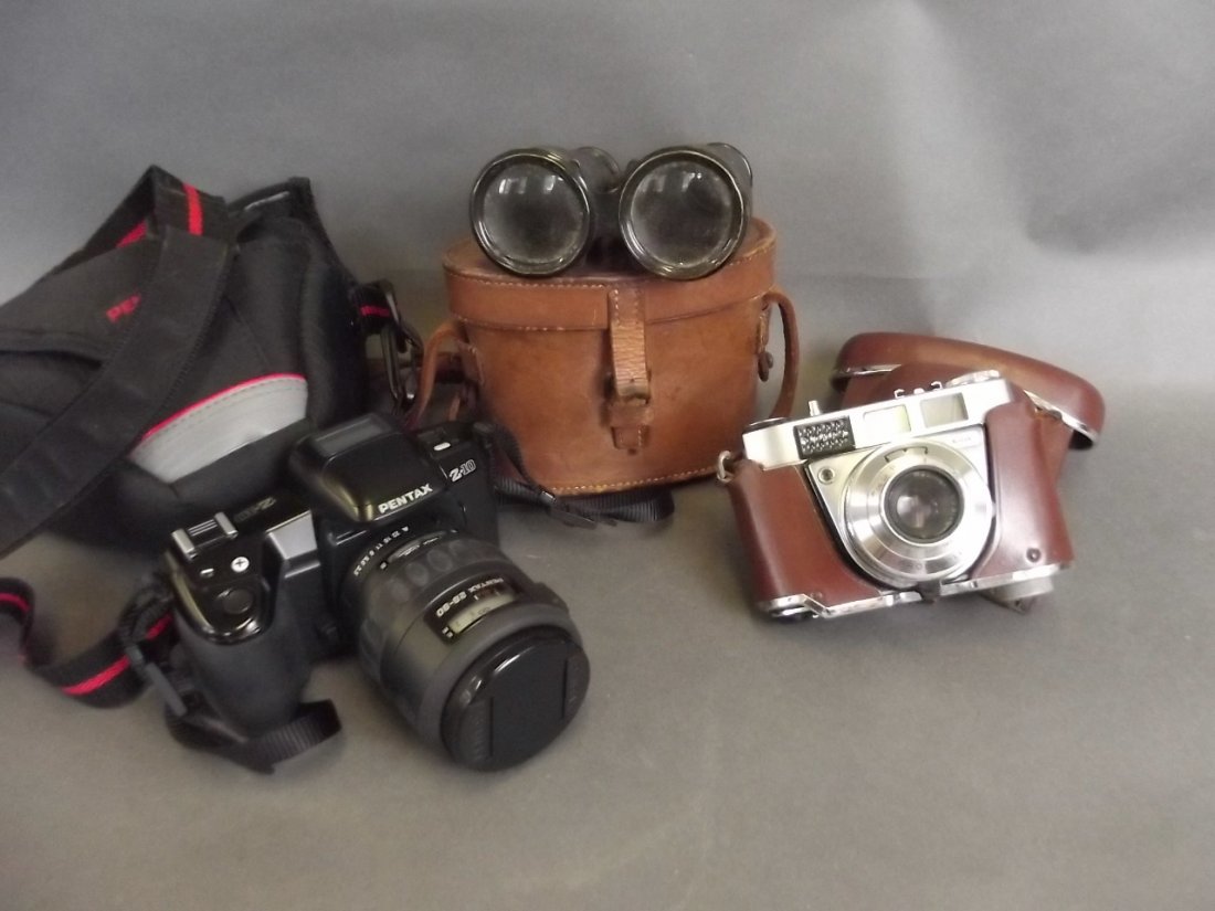 A cased Pentax 35mm camera, a Kodak Retinette 35mm (1 of 1)