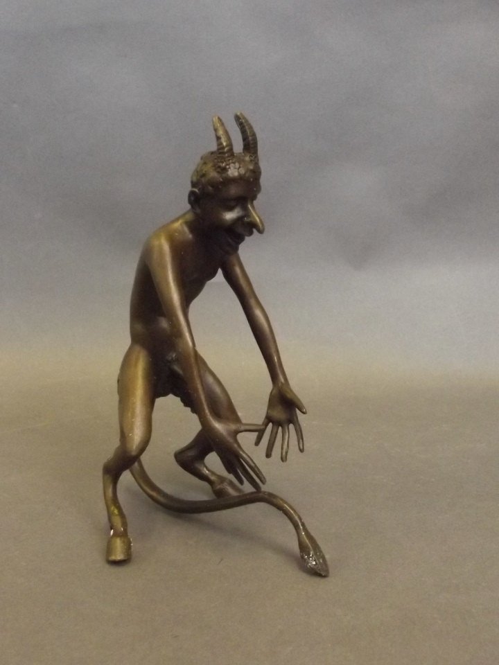 A bronze figure of the devil, 6½'' high: A bronze figure of the devil, 6½'' high