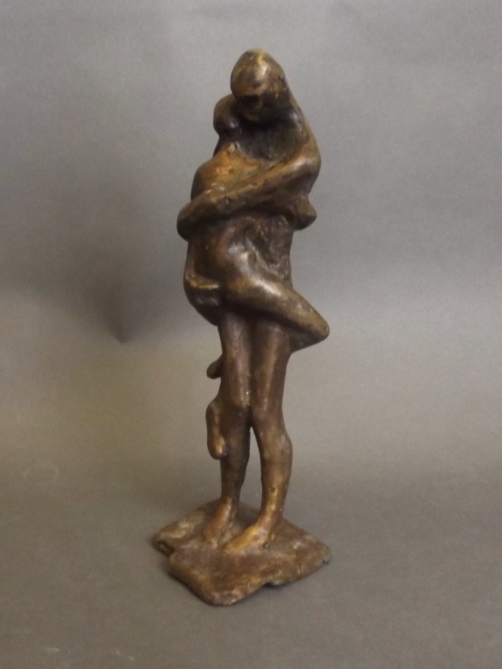A contemporary bronze sculpture of two nudes embracing, (1 of 2)