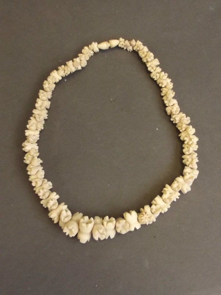 A Maori graduated bone necklace, 16'' long: A Maori graduated bone necklace, 16'' long