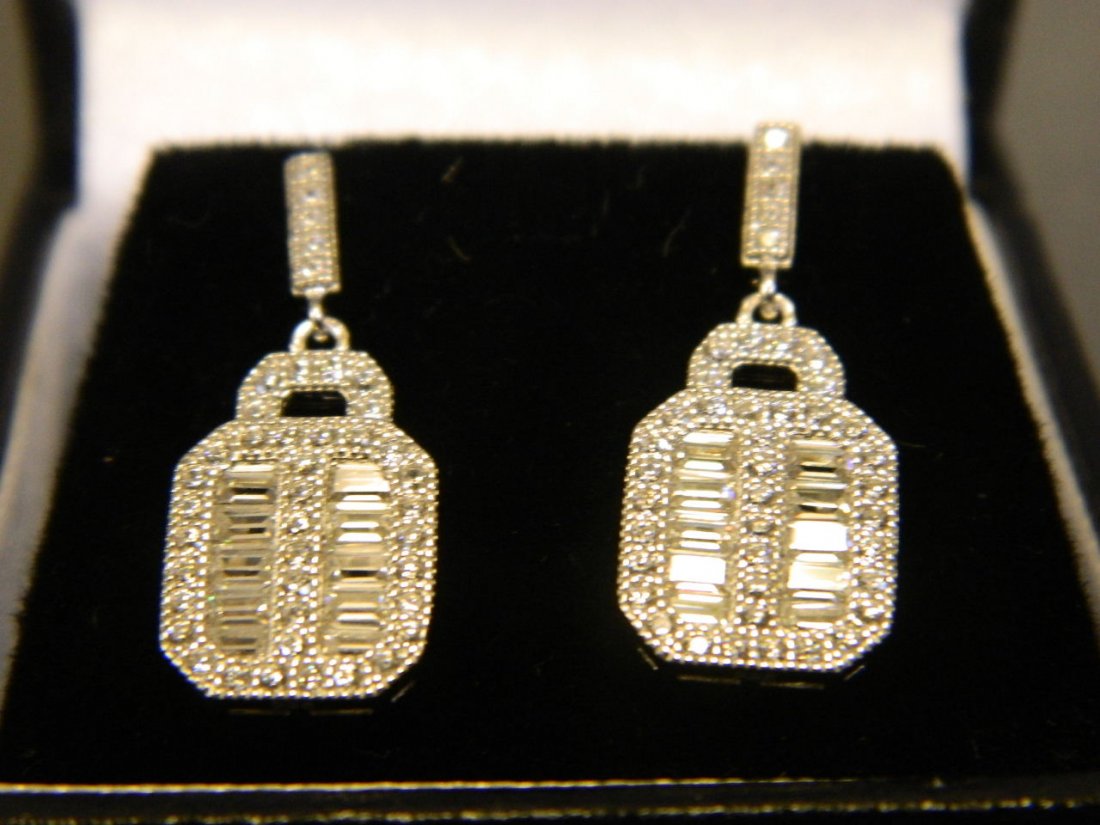 A pair of silver and cubic zirconia earrings, 1'' drop: A pair of silver and cubic zirconia earrings, 1'' drop