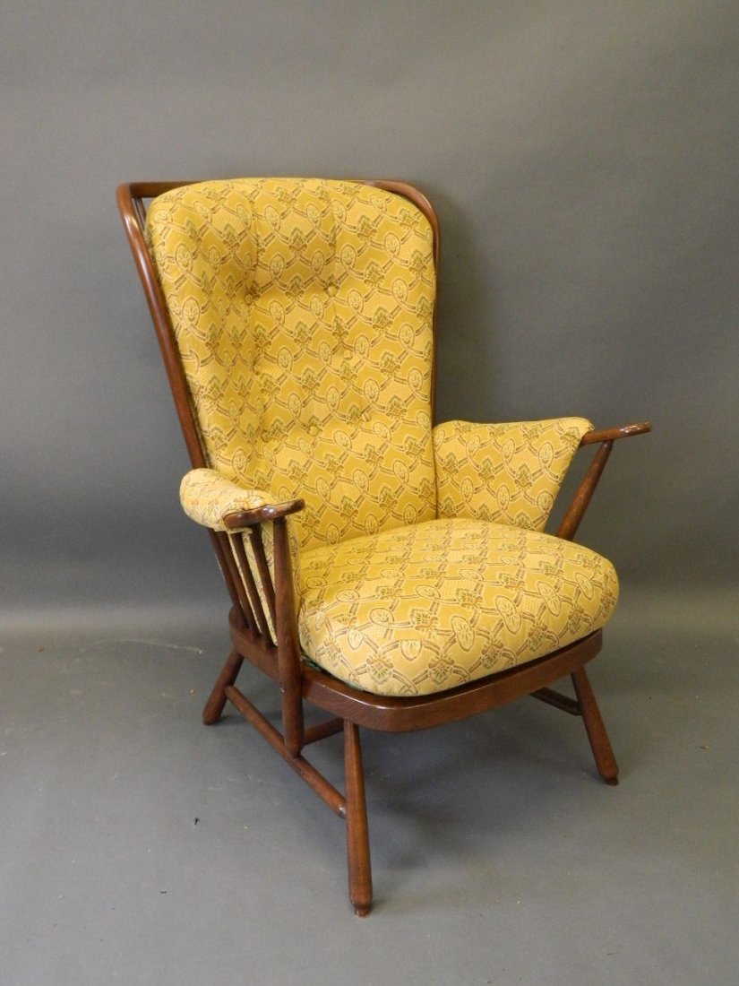 An Ercol stained beech armchair, 40'' high: An Ercol stained beech armchair, 40'' high