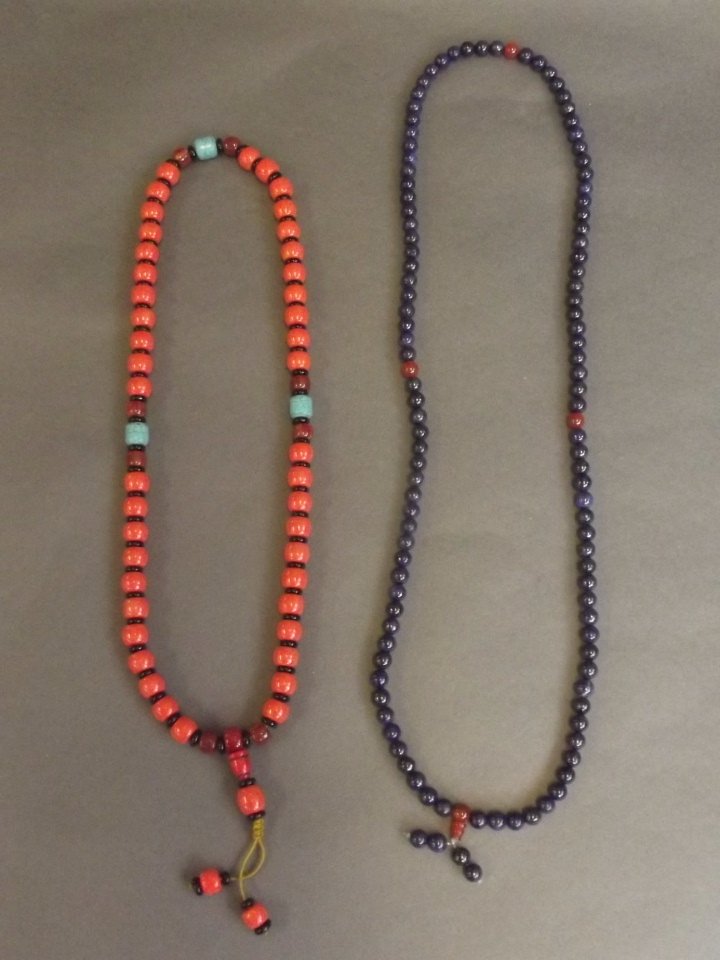 A string of coral beads with turquoise feature beads, (1 of 2)