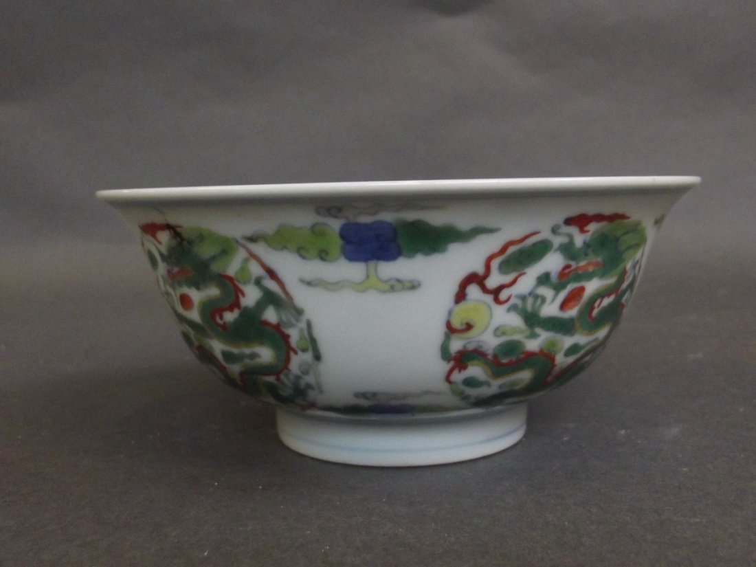 A large Chinese Doucai bowl decorated with dragons, (1 of 3)