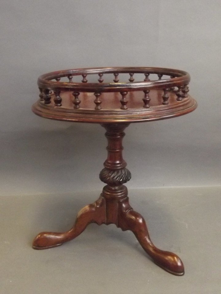 A miniature turned tripod table with a galleried top,: A miniature turned tripod table with a galleried top, 11'' x 9''