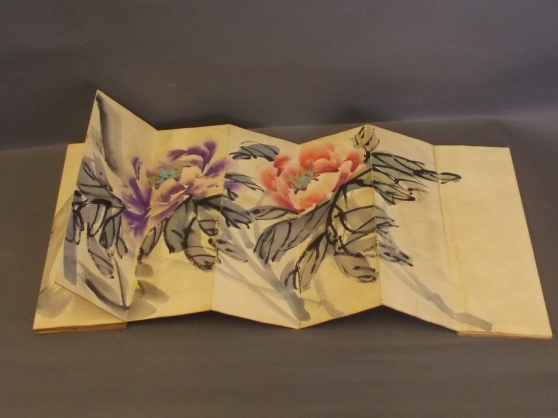 A Chinese concertina book painted with fruits and: A Chinese concertina book painted with fruits and flowers, 11'' closed