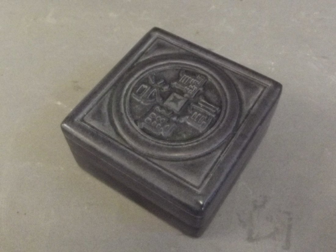 A Chinese black hardstone box carved with calligraphy, (1 of 2)