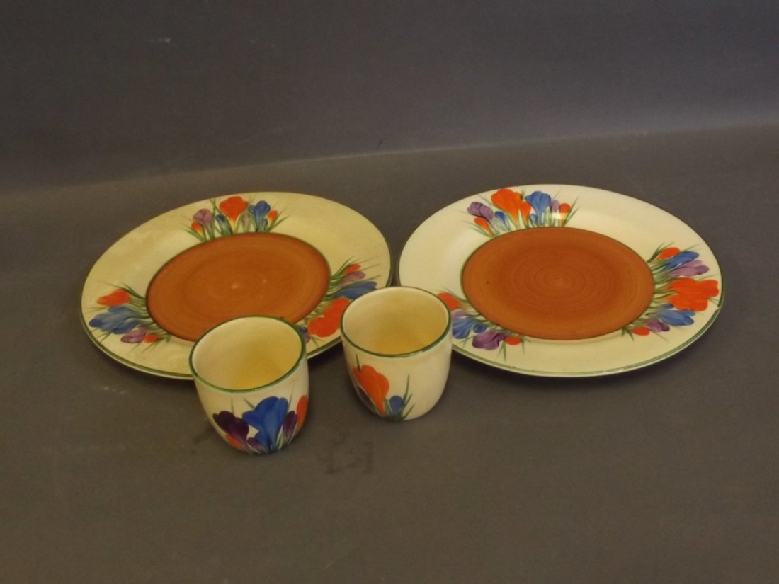 A pair of Clarice Cliff crocus pattern bread plates,: A pair of Clarice Cliff crocus pattern bread plates, and a similar pair of egg cups