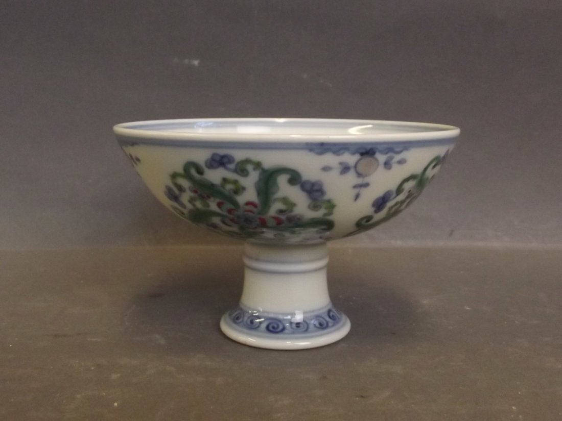 A Chinese Doucai stem cup, seal mark to base, 2'' high (1 of 2)