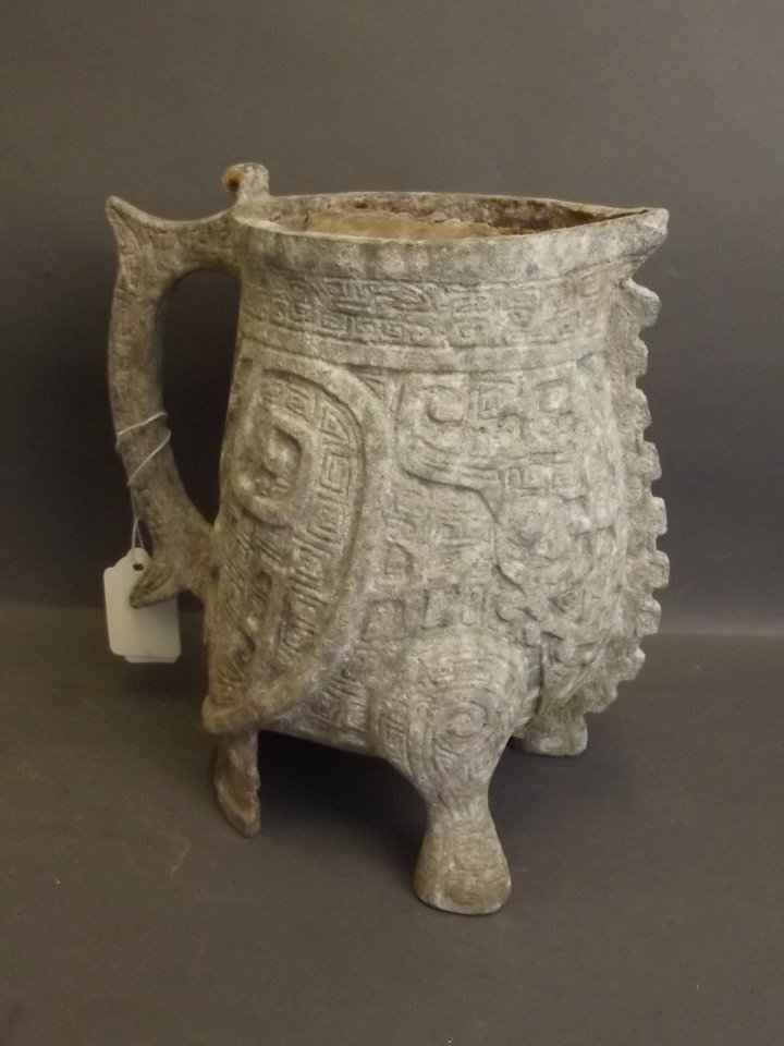 A Chinese white metal pourer in the form of a bird with (1 of 2)