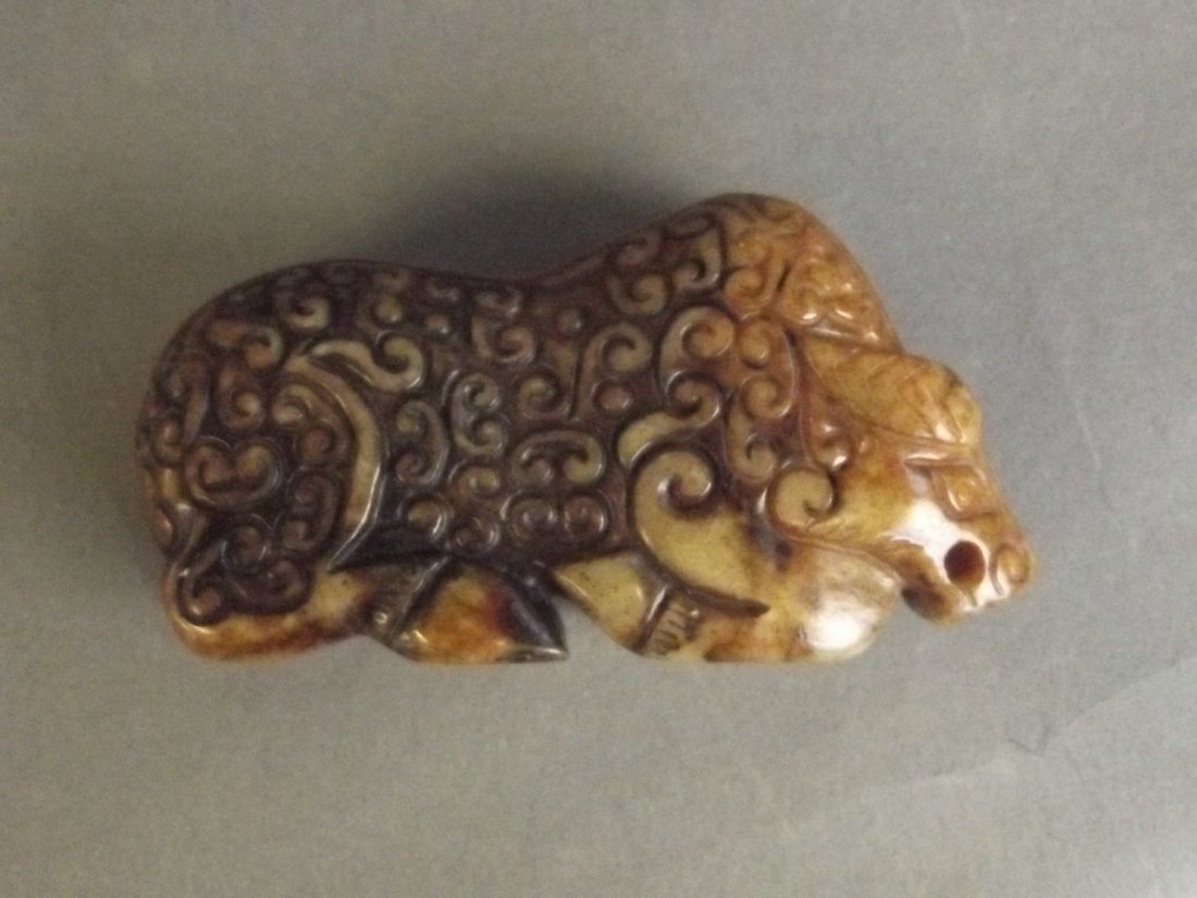 A Chinese hardstone pendant carved in the form of an (1 of 1)