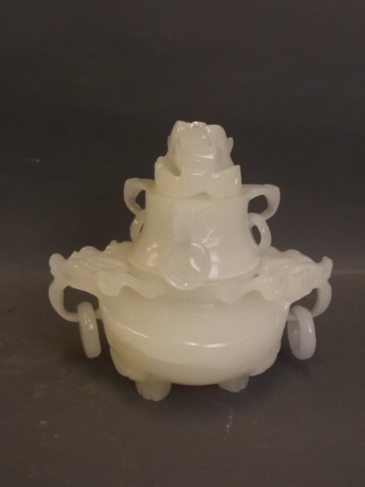 A Chinese reconstituted white jade koro with carved (1 of 2)