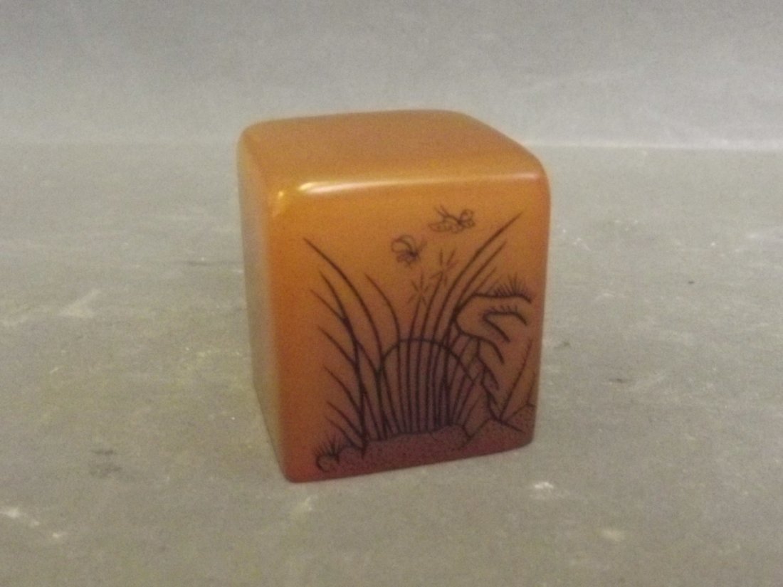 A Chinese soapstone seal carved with calligraphy and: A Chinese soapstone seal carved with calligraphy and insects, 1'' high