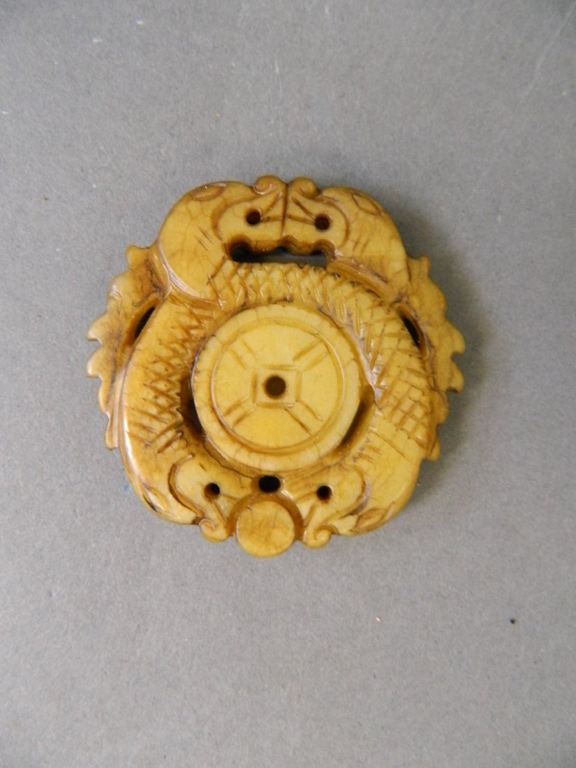 A Chinese yellow jade pendant with carved and pierced (1 of 1)