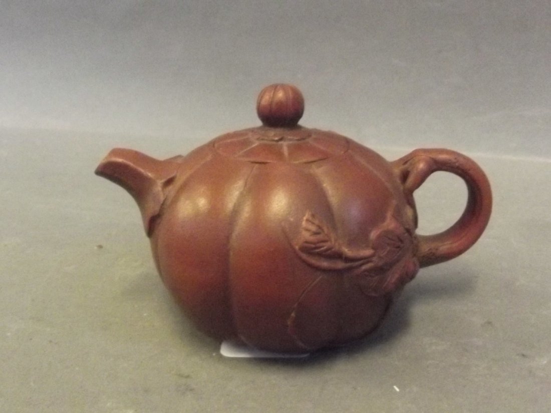 A small Chinese Yixing teapot in the form of a pumpkin, (1 of 1)