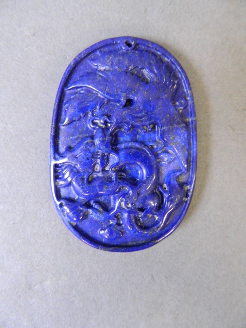 A Chinese oval carved lapis lazuli pendant with phoenix (1 of 1)