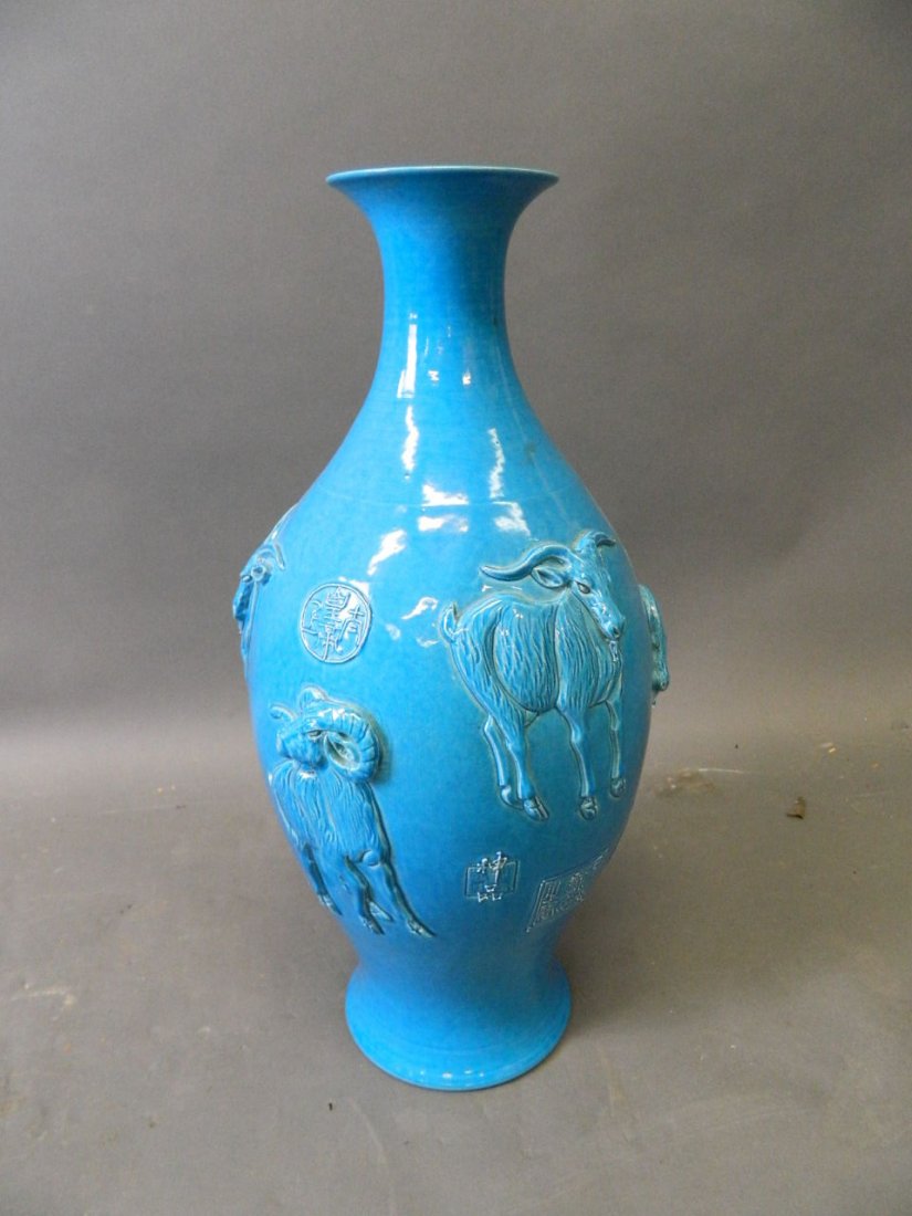 A good Chinese blue glazed vase with relief decoration (1 of 2)