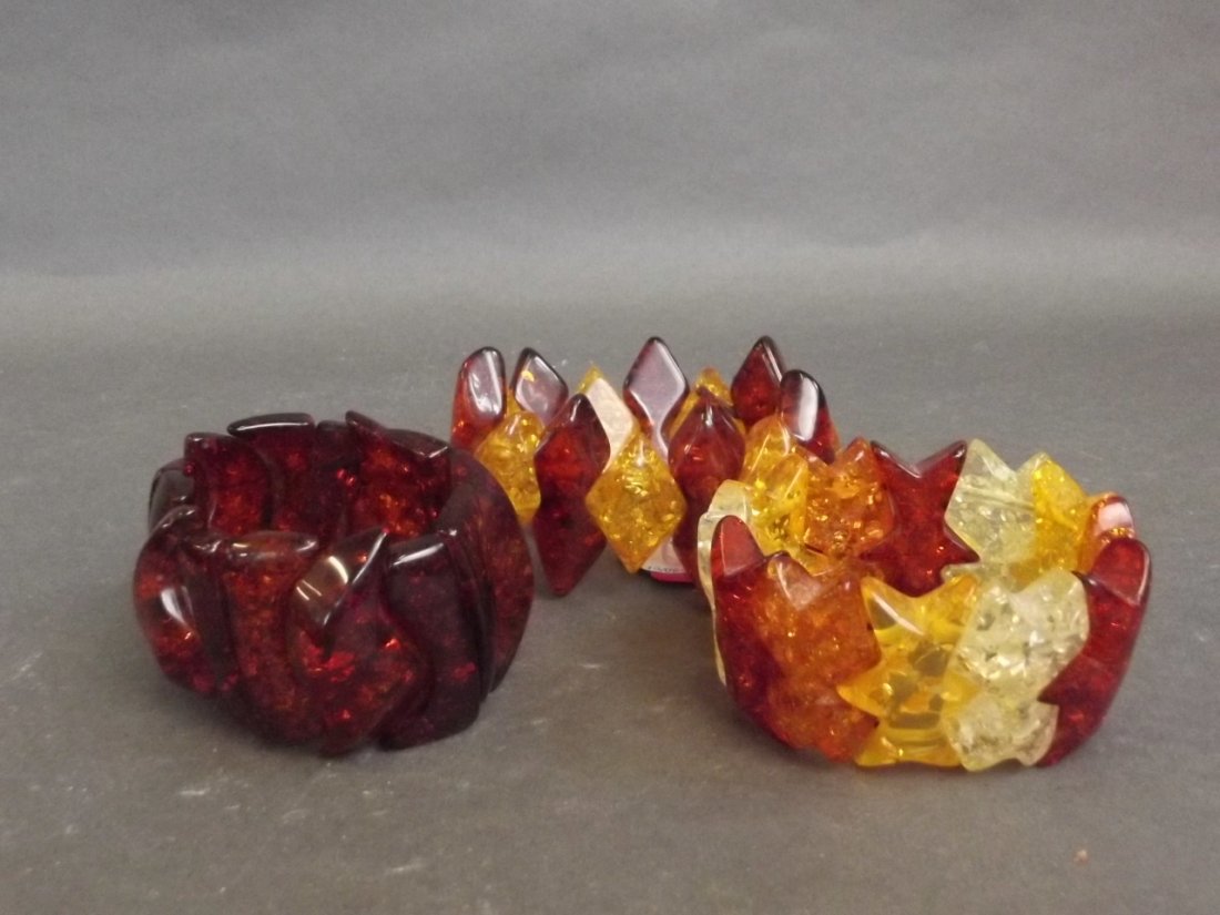 Three reconstituted amber bangles of various sizes: Three reconstituted amber bangles of various sizes