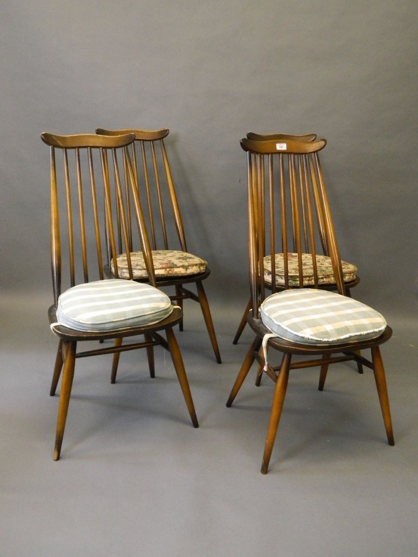 A set of four Ercol comb back dining chairs: A set of four Ercol comb back dining chairs