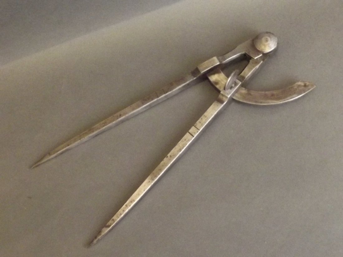 A pair of early C20th metal dividers, marked 'W.: A pair of early C20th metal dividers, marked 'W. Marples & Sons', 10'' long