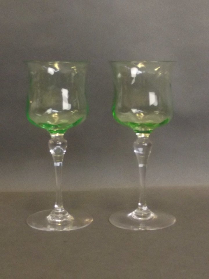 A pair of Thomas Webb 'Uranium' glass goblets, marked: A pair of Thomas Webb 'Uranium' glass goblets, marked to base, 6'' high